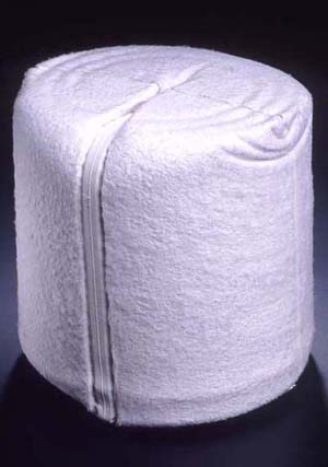 pink plaster reconciled baby sculpture